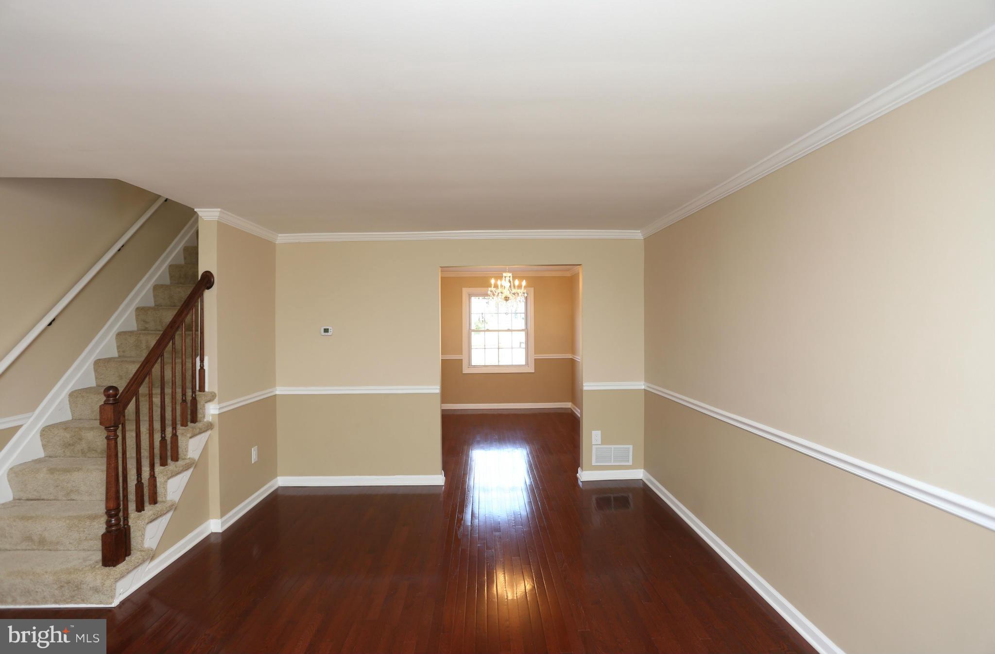 4440 Fenor Road Baltimore, MD 21227 - Photo 4 of 30 a view of entryway with wooden floor