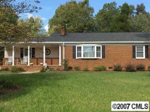 a view front of house with a yard