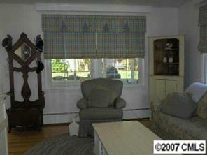 440 Westbury Road Charlotte, NC 28211 - Photo 4 of 8 a living room with furniture and a window