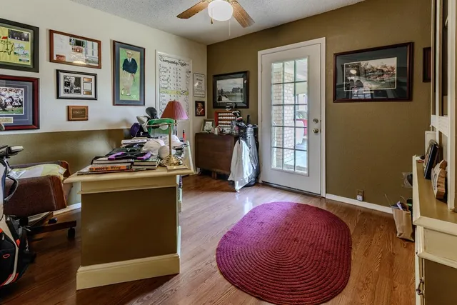 a room with furniture and musical instruments