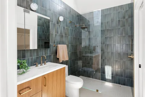 a bathroom with a sink and toilet