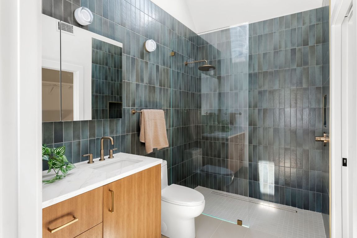 5212 Evans Avenue Austin, TX 78751 - Photo 20 of 34 a bathroom with a sink and toilet