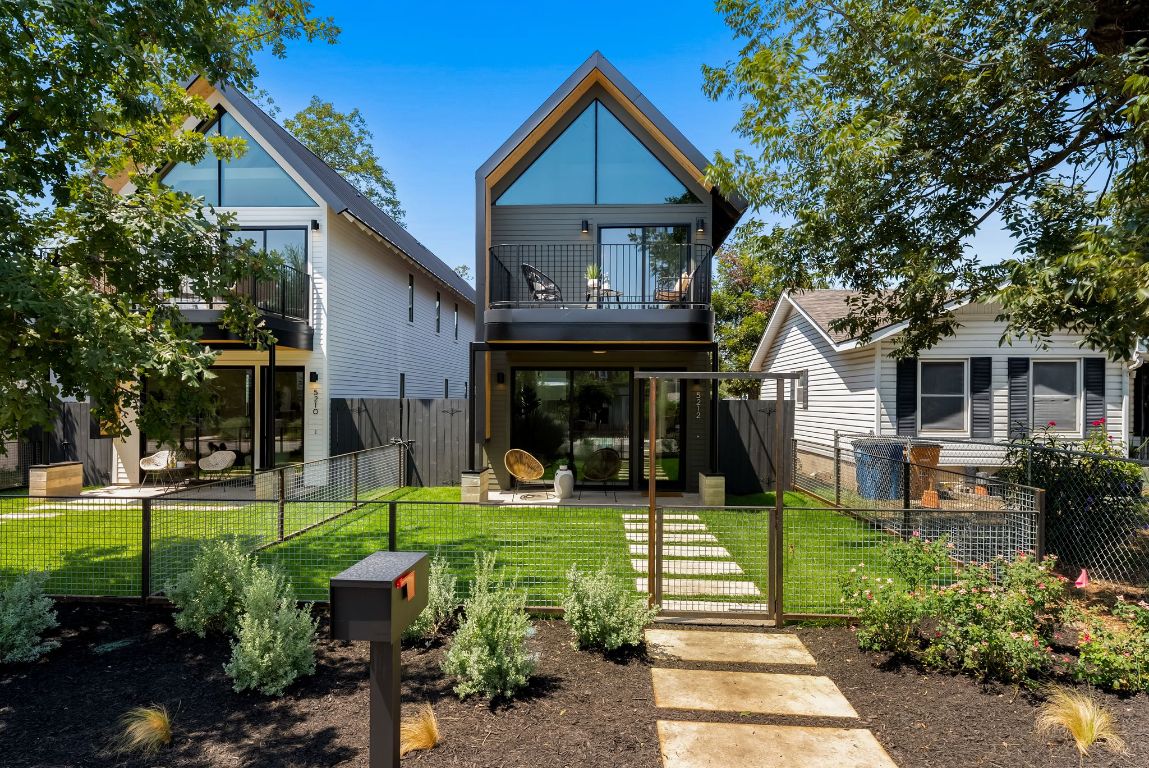 5212 Evans Avenue Austin, TX 78751 - Photo 2 of 34 a front view of a house with a yard table and chairs