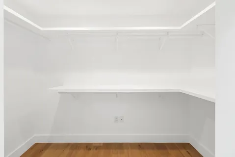 a view of small space with racks on the wall