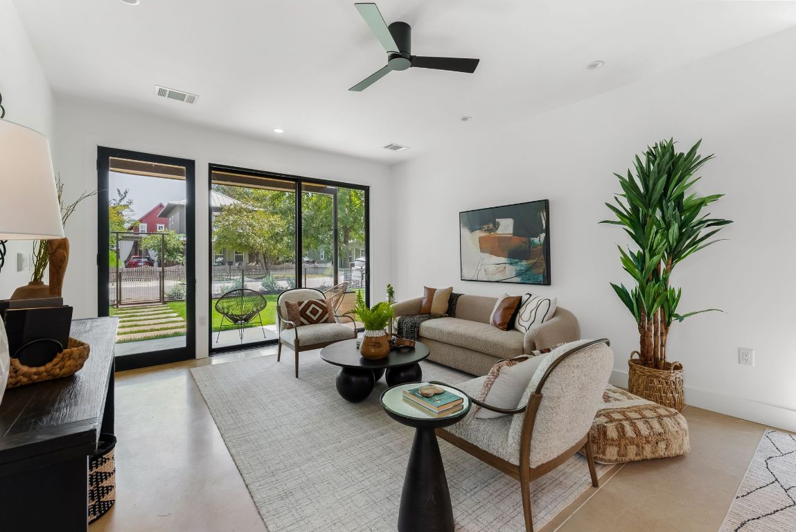 5212 Evans Avenue Austin, TX 78751 - Photo 4 of 34 a living room with furniture and a large window