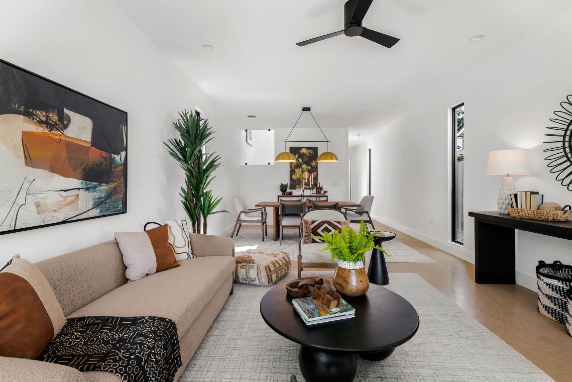 5212 Evans Avenue Austin, TX 78751 - Photo 5 of 34 a living room with furniture and a wooden floor