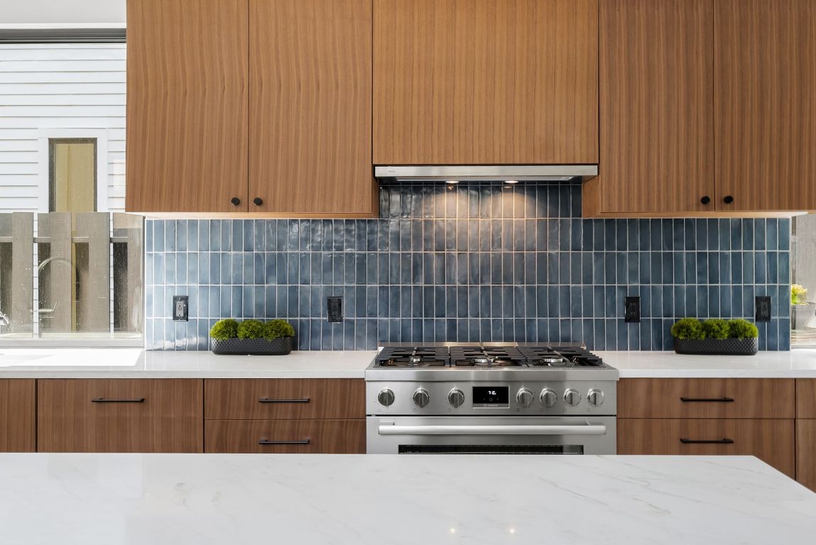 5212 Evans Avenue Austin, TX 78751 - Photo 10 of 34 a kitchen with a stove and cabinets
