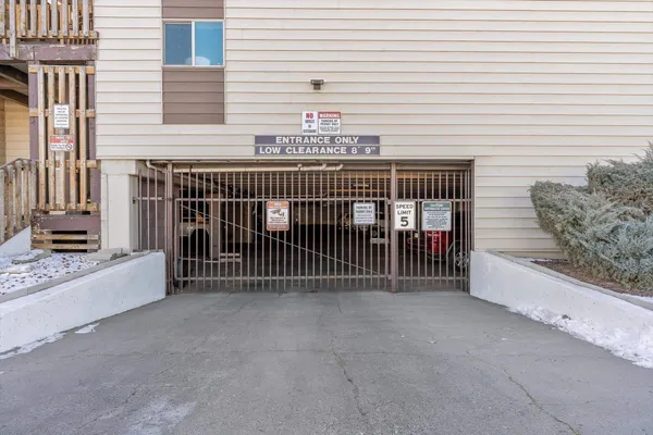 a view of a swimming pool with a lounge chair