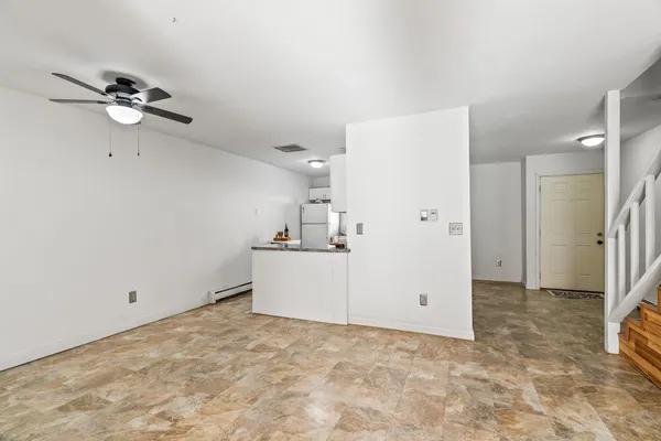 a view of a room with stairs