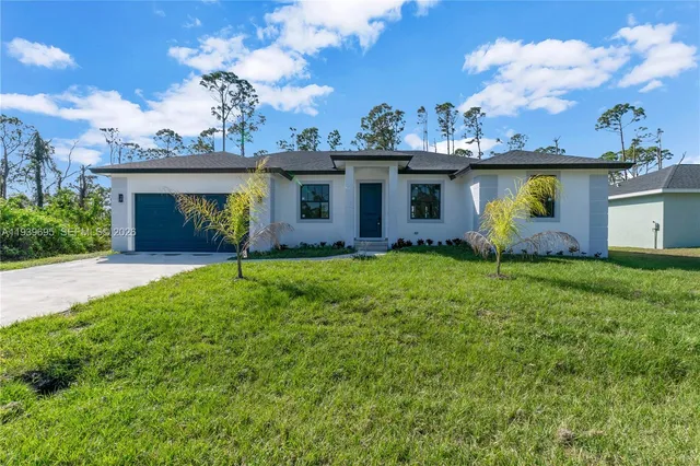 a view of a house with a garden