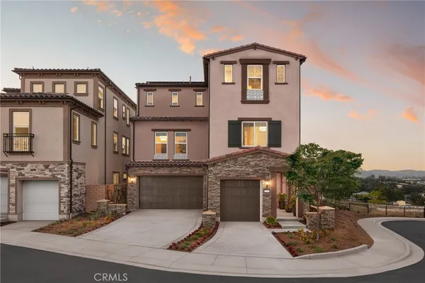 a front view of a house with entertaining space