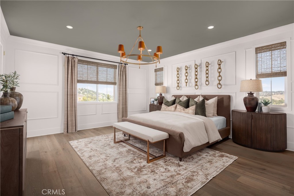 22085 Manarola Way Walnut, CA 91789 - Photo 13 of 20 a spacious bedroom with a bed a couch and a window