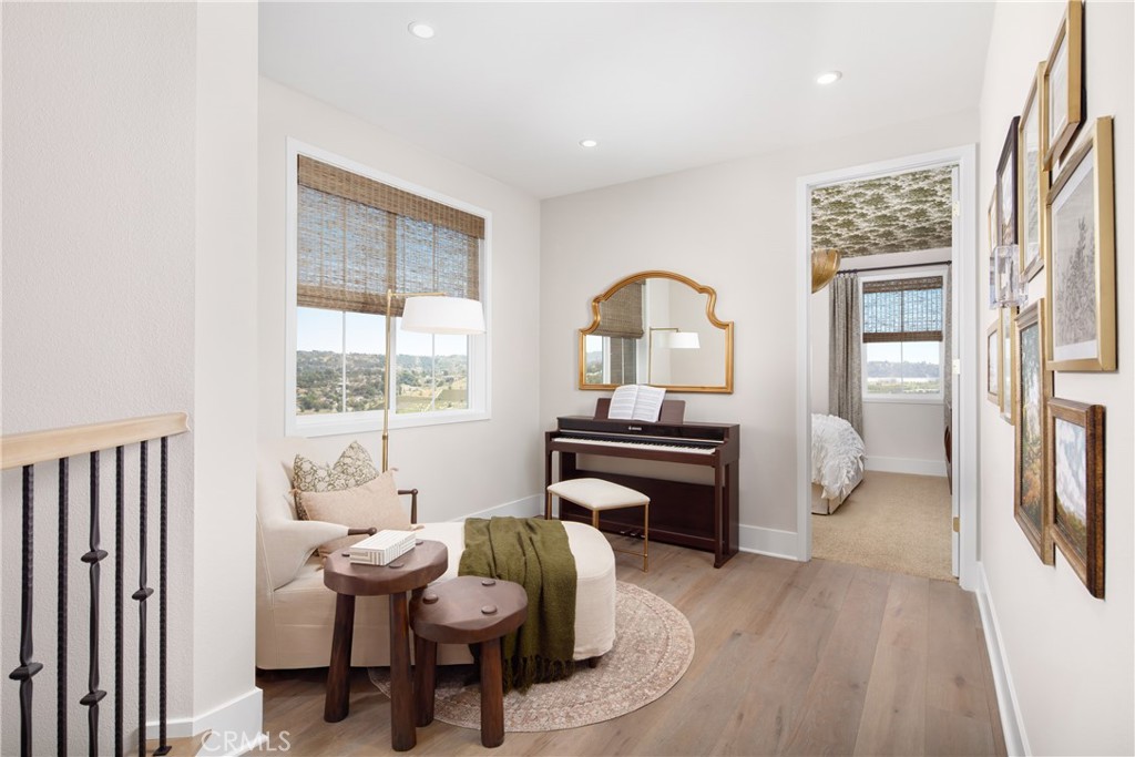 22085 Manarola Way Walnut, CA 91789 - Photo 17 of 20 a living room with furniture a piano and a window