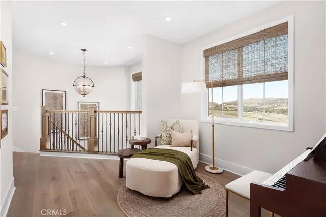 a bedroom with bed and a window