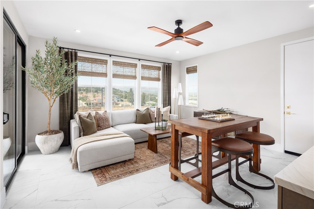 22085 Manarola Way Walnut, CA 91789 - Photo 3 of 20 a living room with furniture a large window and a table