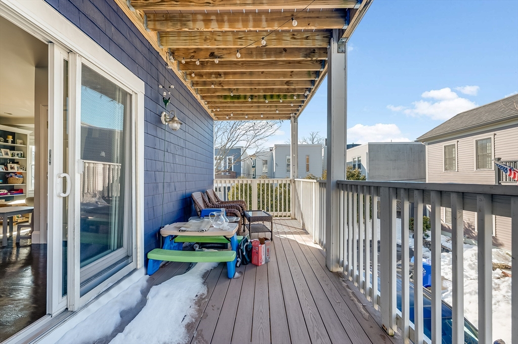 720 East 8th Street, Unit 2 Boston, MA 02127 - Photo 12 of 14 a balcony with furniture and garden view