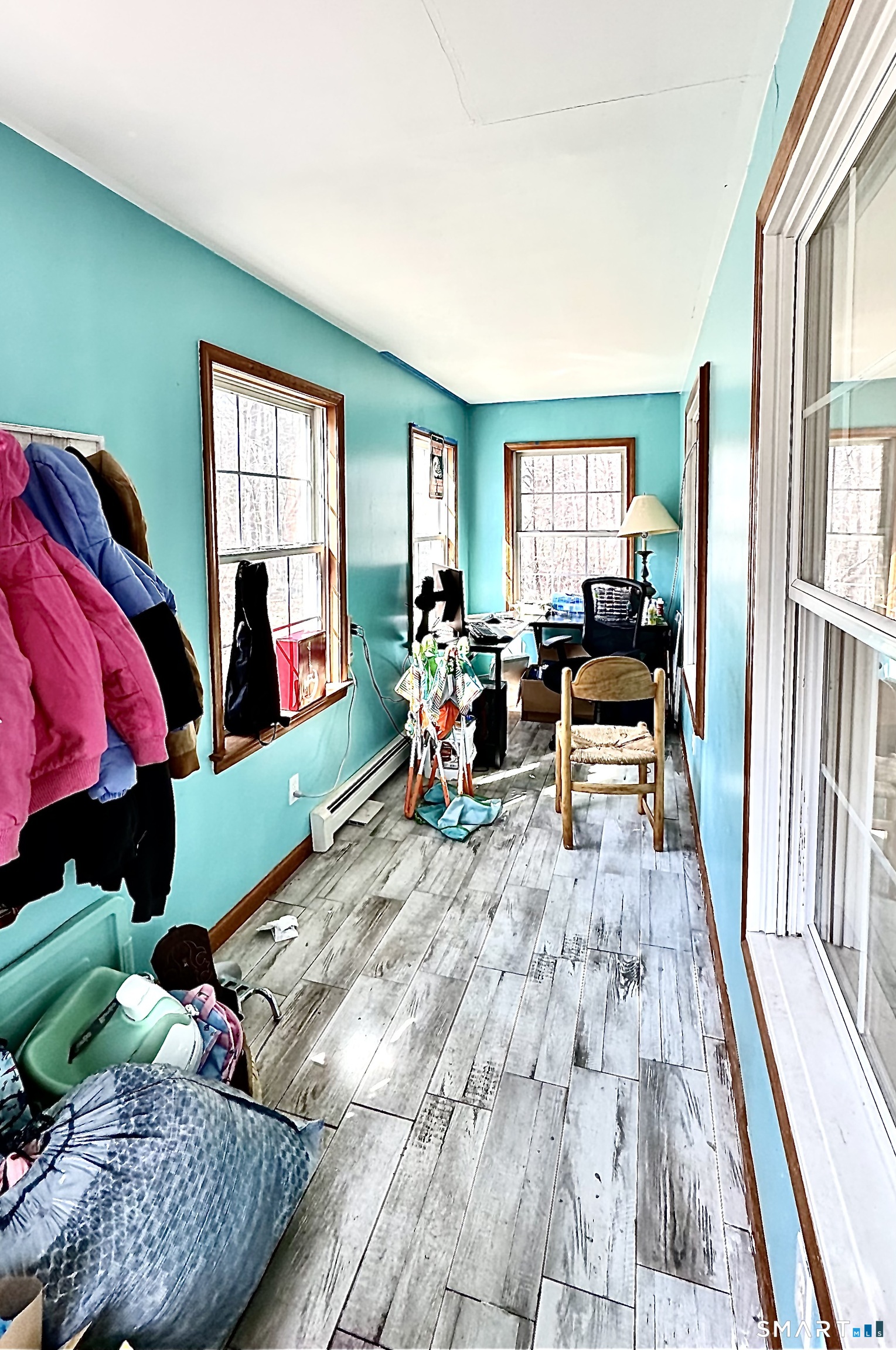 512 Brook Road Scotland, CT 06247 - Photo 11 of 22 a living room with furniture and a wooden floor