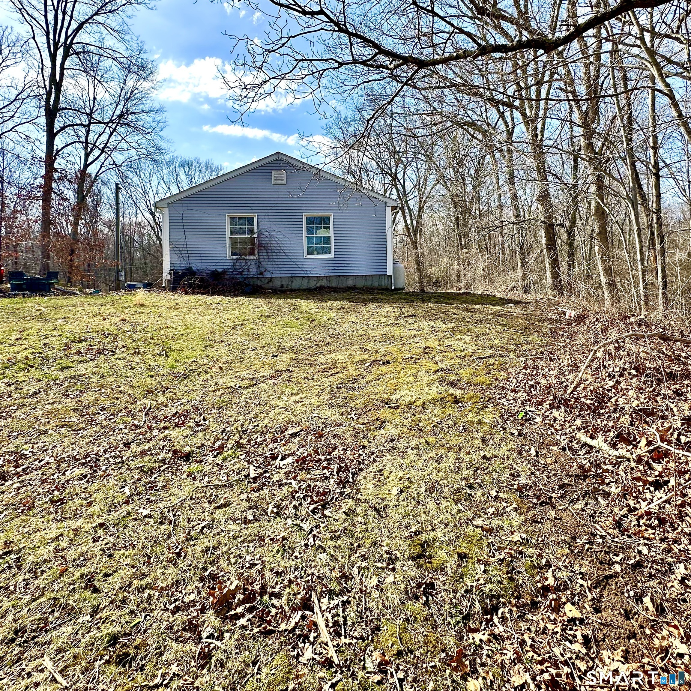 512 Brook Road Scotland, CT 06247 - Photo 19 of 22 a house that has a tree in front of it