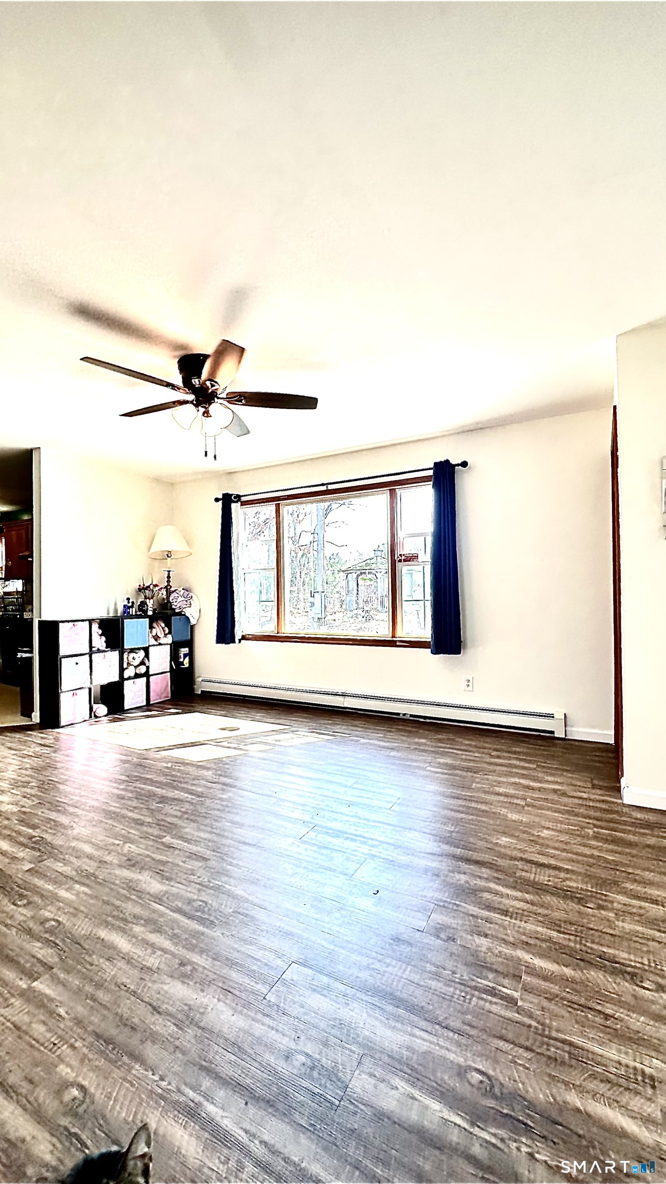 512 Brook Road Scotland, CT 06247 - Photo 3 of 22 an empty room with wooden floor and windows