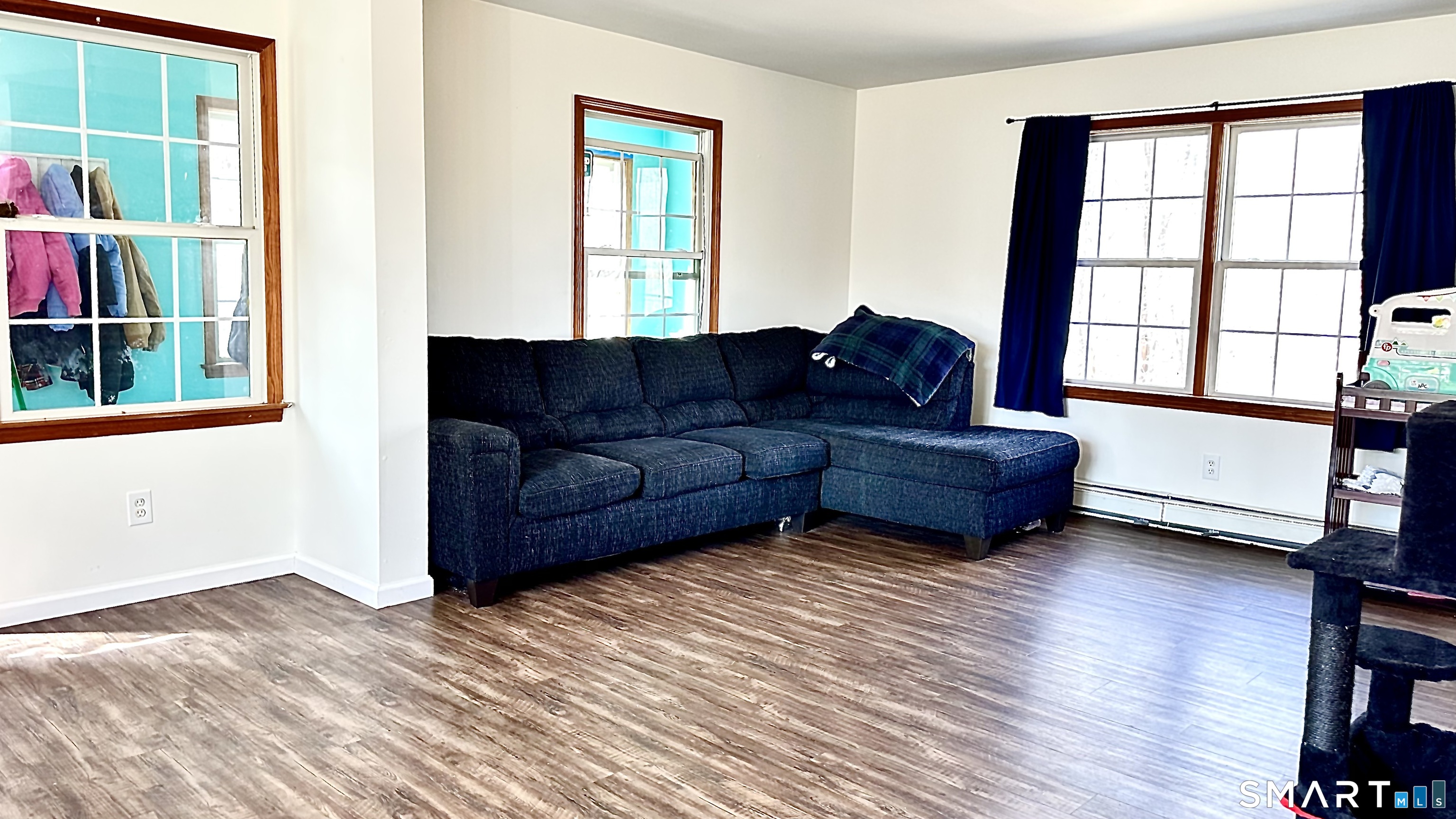 512 Brook Road Scotland, CT 06247 - Photo 5 of 22 a living room with furniture and a window