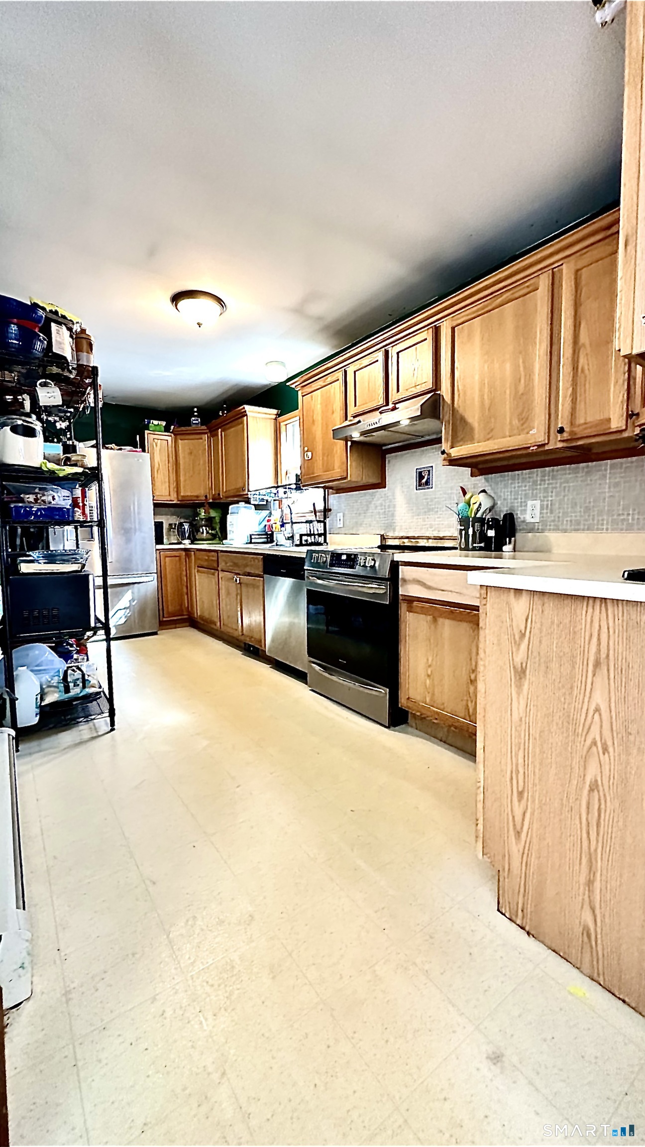 512 Brook Road Scotland, CT 06247 - Photo 9 of 22 a large white kitchen with a large window