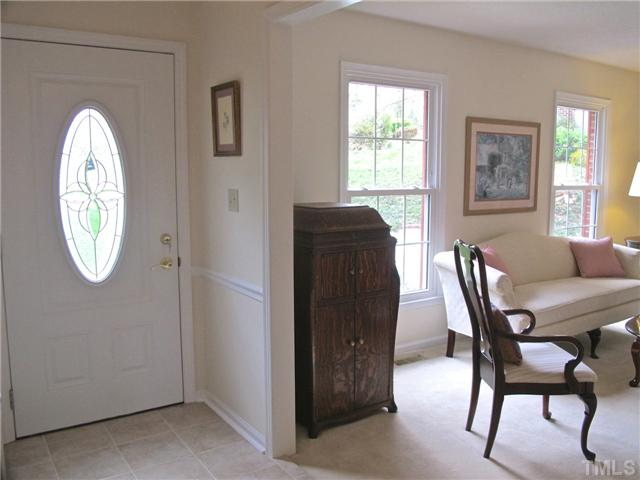 6509 Dew Drop Court Raleigh, NC 27613 - Photo 2 of 25 a dining room with furniture and a window