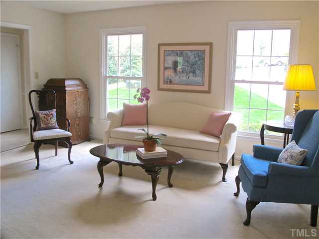 6509 Dew Drop Court Raleigh, NC 27613 - Photo 4 of 25 a living room with furniture and a window