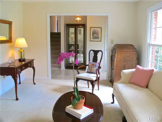 6509 Dew Drop Court Raleigh, NC 27613 - Photo 6 of 25 a living room with furniture and a window