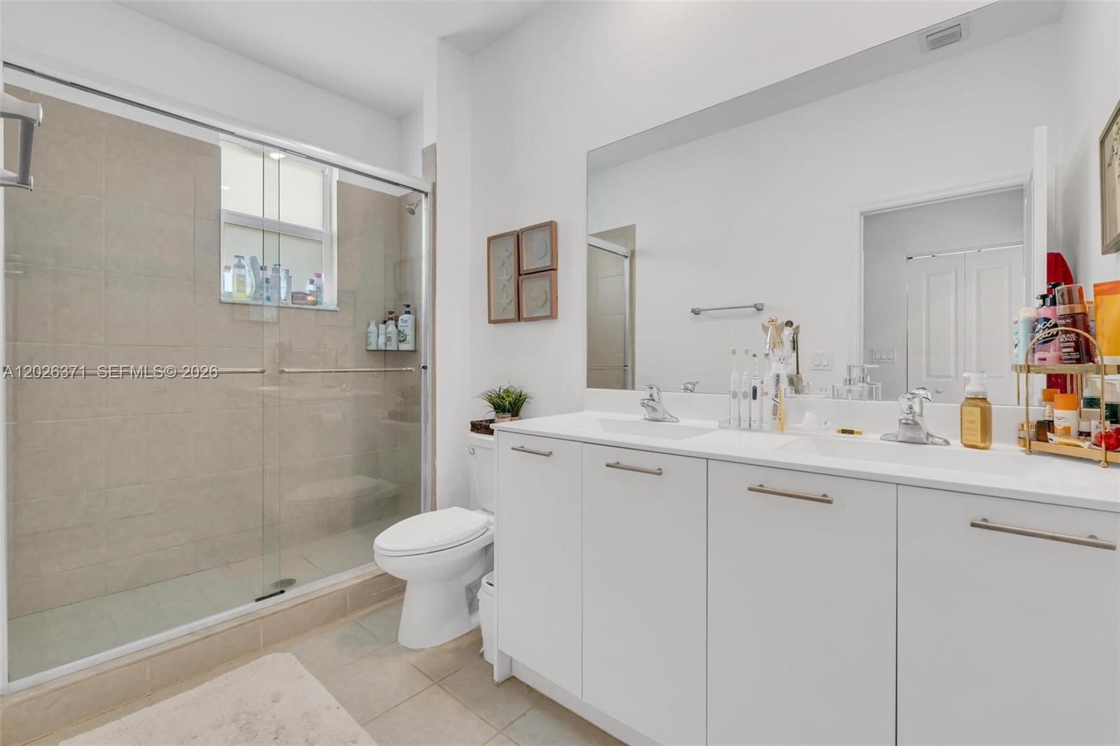 2273 Northwest 131st Circle Miami, FL 33167 - Photo 28 of 46 a bathroom with a sink toilet and shower