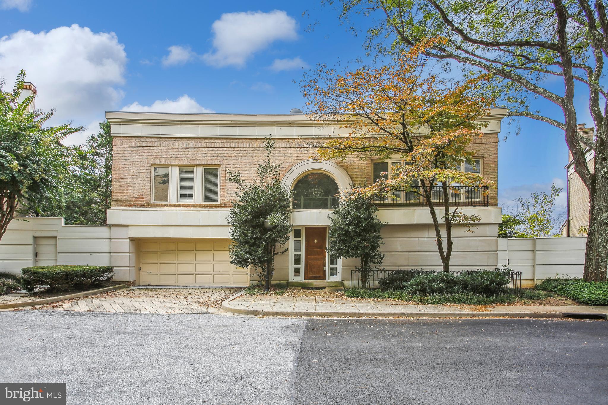 4516 Foxhall Crescent Northwest Washington, DC 20007 - Photo 1 of 30 a front view of a house