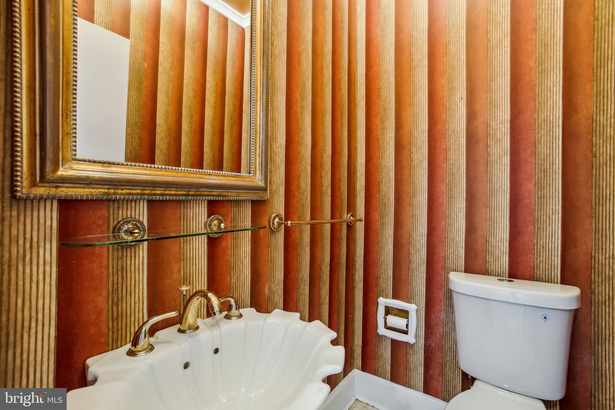 4516 Foxhall Crescent Northwest Washington, DC 20007 - Photo 11 of 30 a bathroom with a sink a toilet and a tub