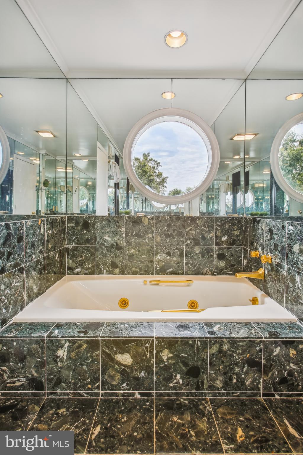 4516 Foxhall Crescent Northwest Washington, DC 20007 - Photo 18 of 30 a bathroom with a bathtub and a sink