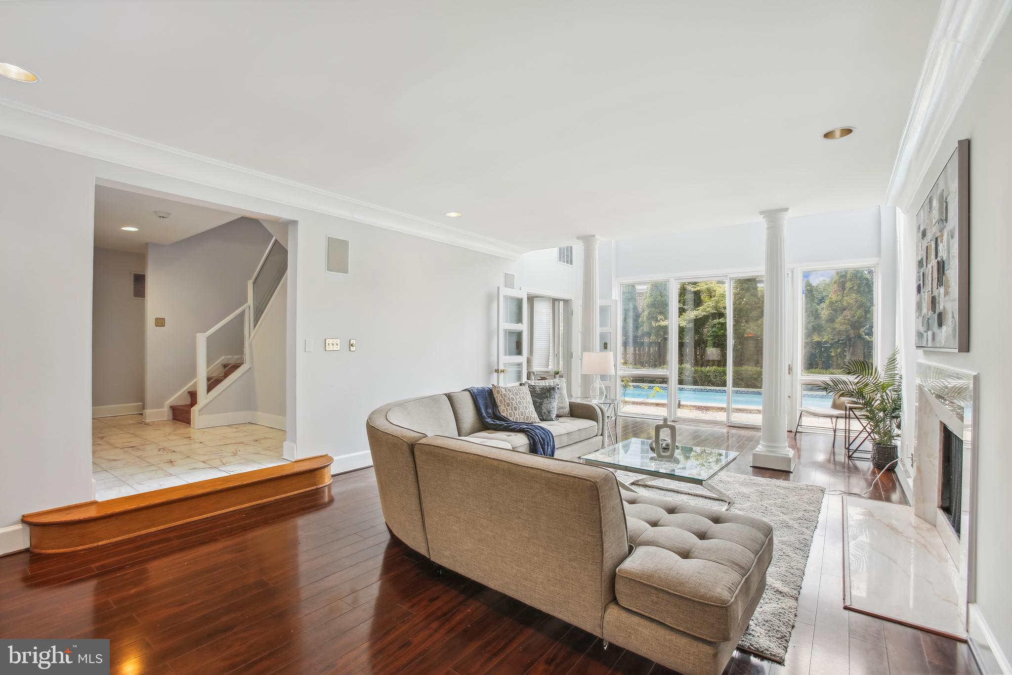 4516 Foxhall Crescent Northwest Washington, DC 20007 - Photo 23 of 30 a living room with furniture and a large window