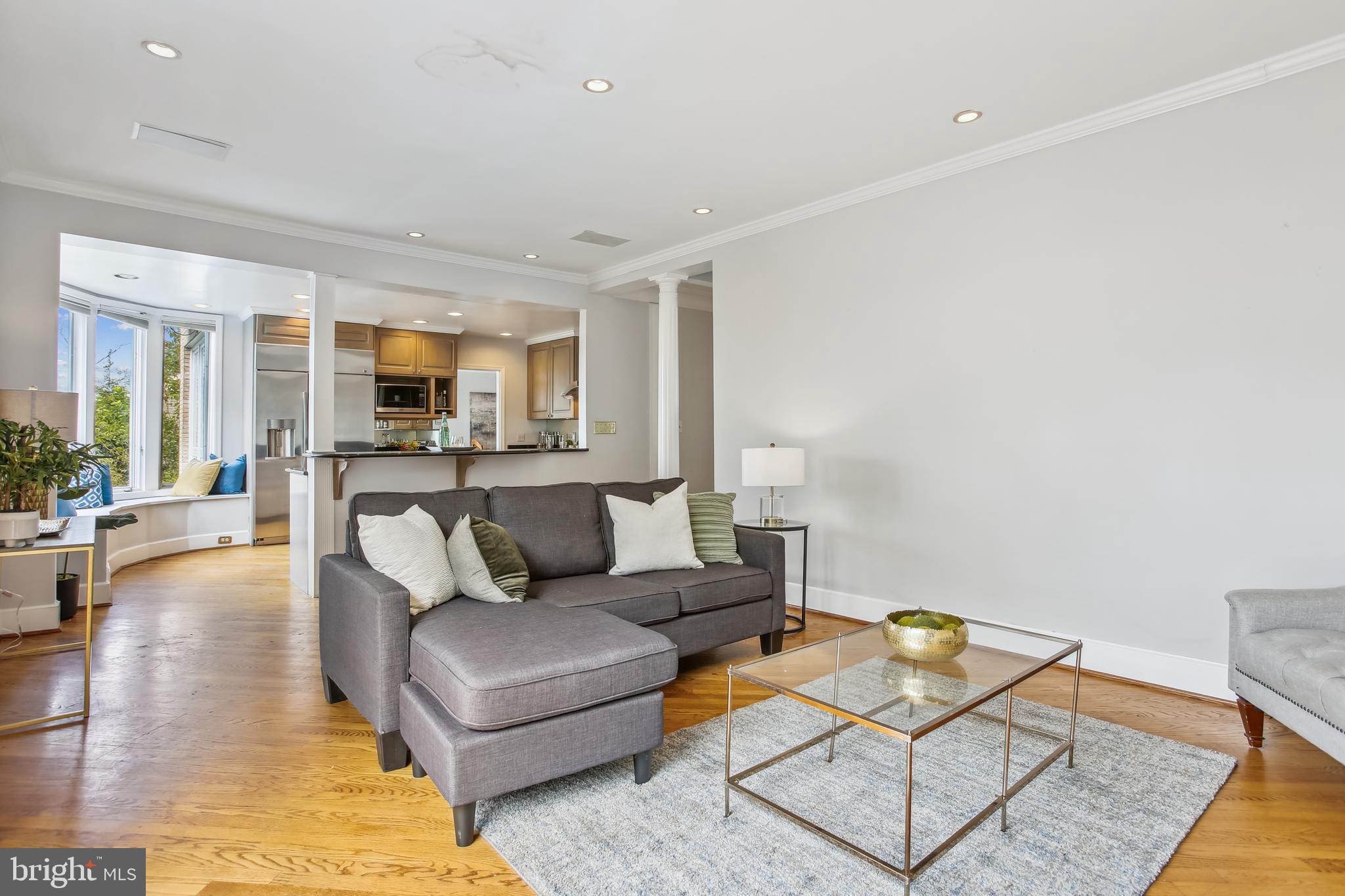 4516 Foxhall Crescent Northwest Washington, DC 20007 - Photo 4 of 30 a living room with furniture and view of kitchen