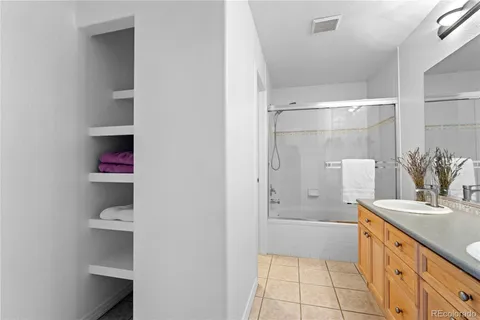 a bathroom with a bathtub and a sink