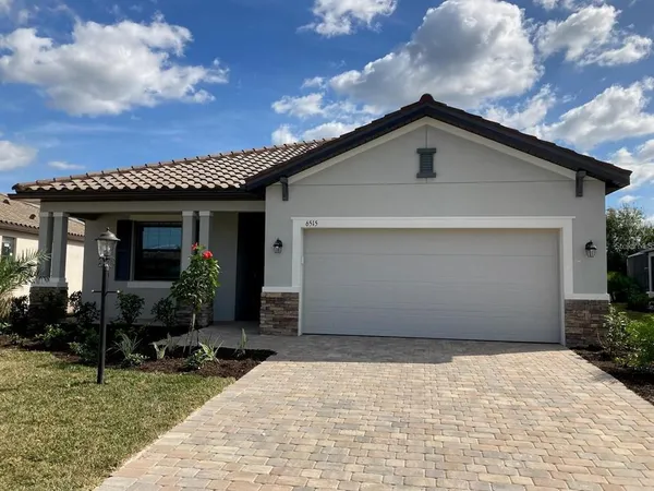 a front view of house with yard