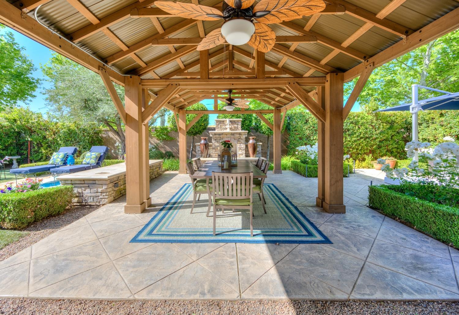 3731 Serena Avenue Clovis, CA 93619 - Photo 39 of 54 a view of a porch with furniture and a yard