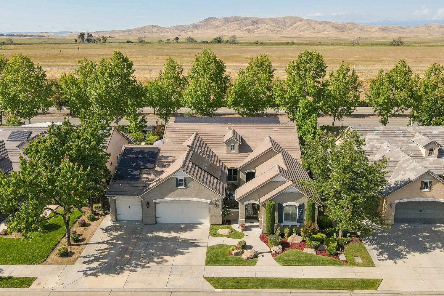 3731 Serena Avenue Clovis, CA 93619 - Photo 47 of 54 a front view of a house with lake view