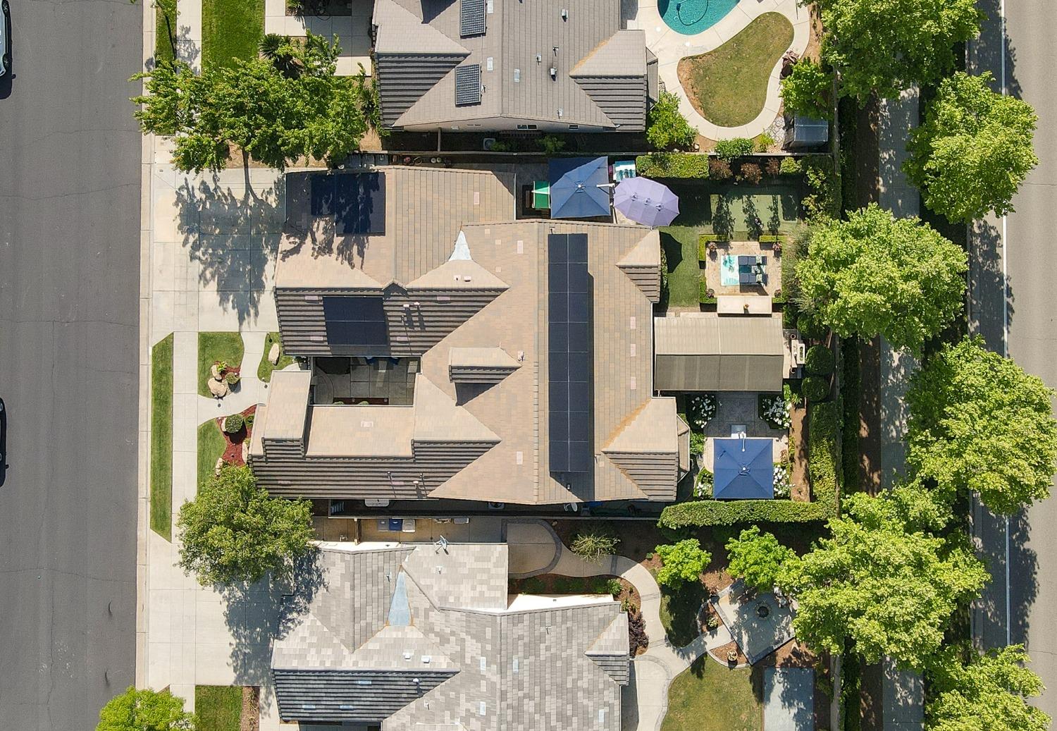 3731 Serena Avenue Clovis, CA 93619 - Photo 49 of 54 an aerial view of a house with a swimming pool
