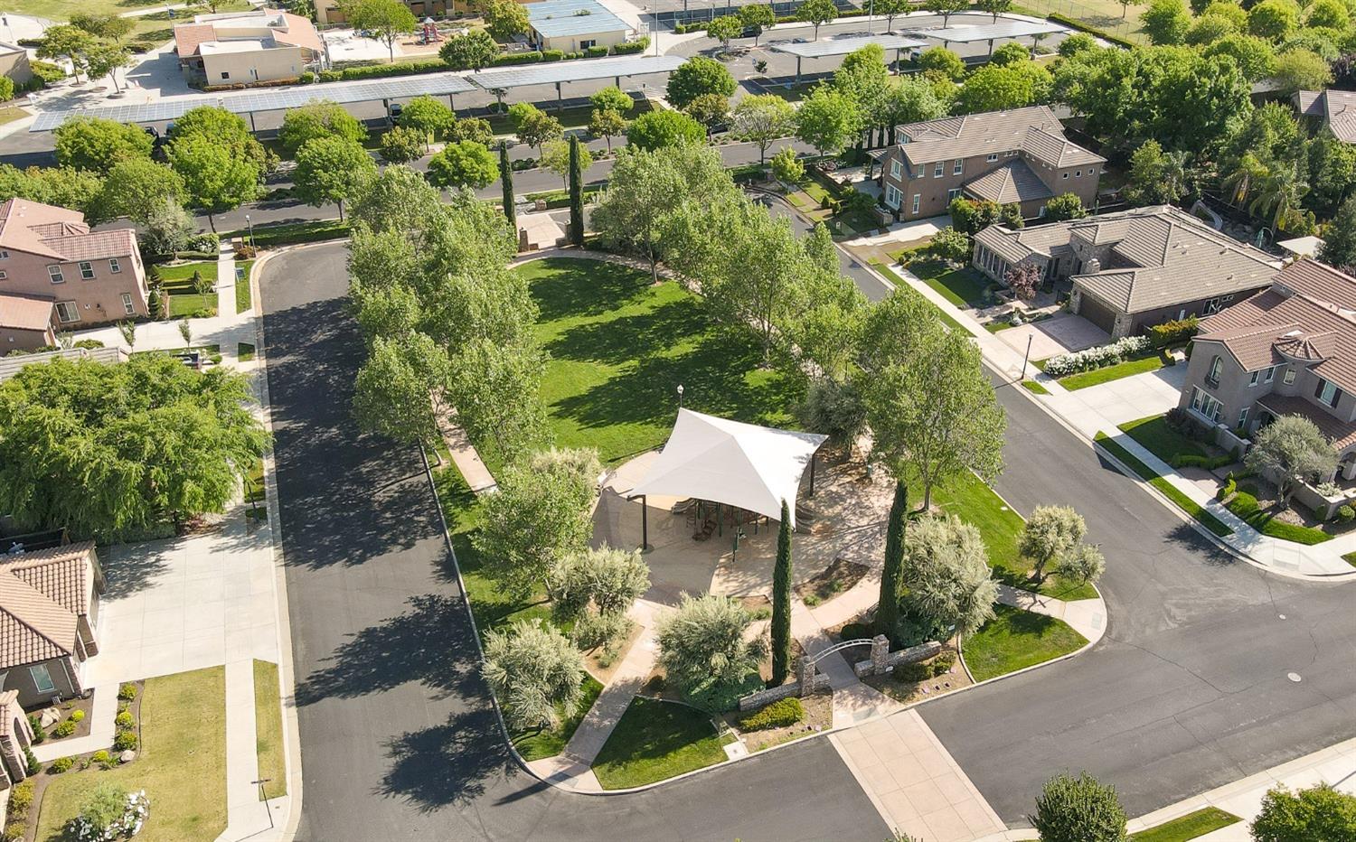 3731 Serena Avenue Clovis, CA 93619 - Photo 53 of 54 an aerial view of a house with a yard and garden