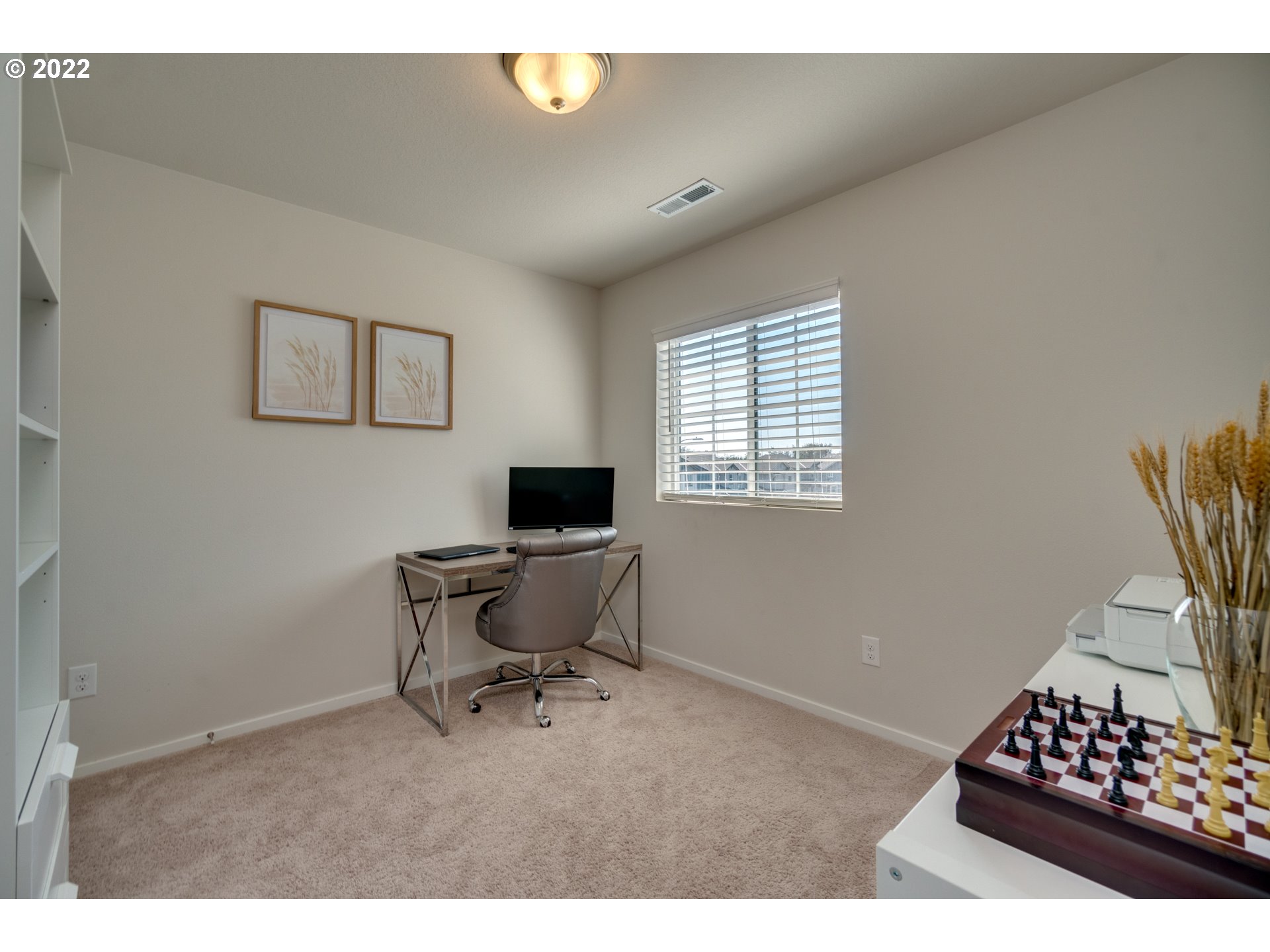 2121 South Meadowlark Dr. Loop Ridgefield, WA 98642 - Photo 16 of 19 a workspace with furniture and a window