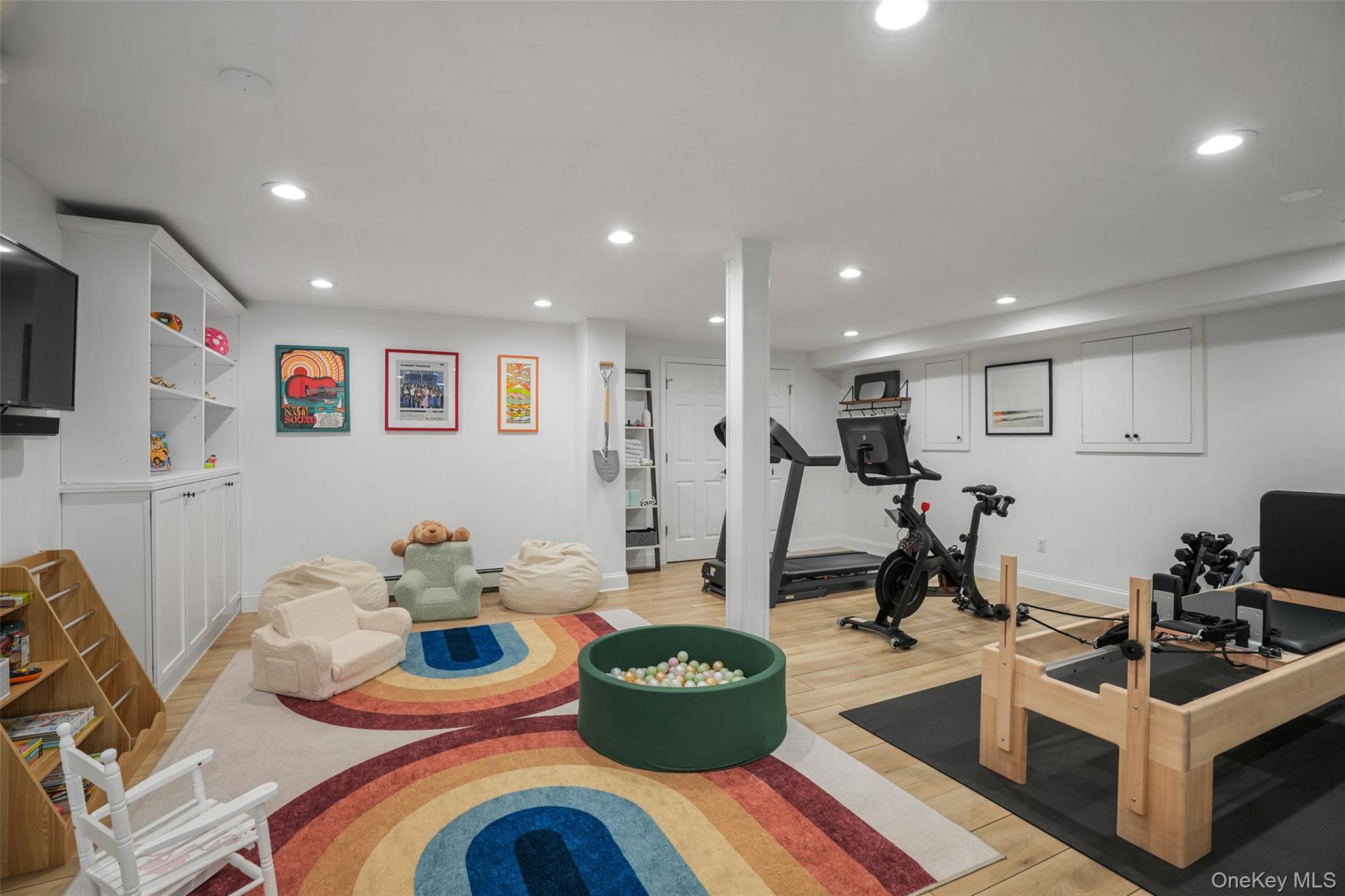 43 Croton Lake Road Katonah, NY 10536 - Photo 20 of 26 a room with furniture a flat screen tv and a view of living room