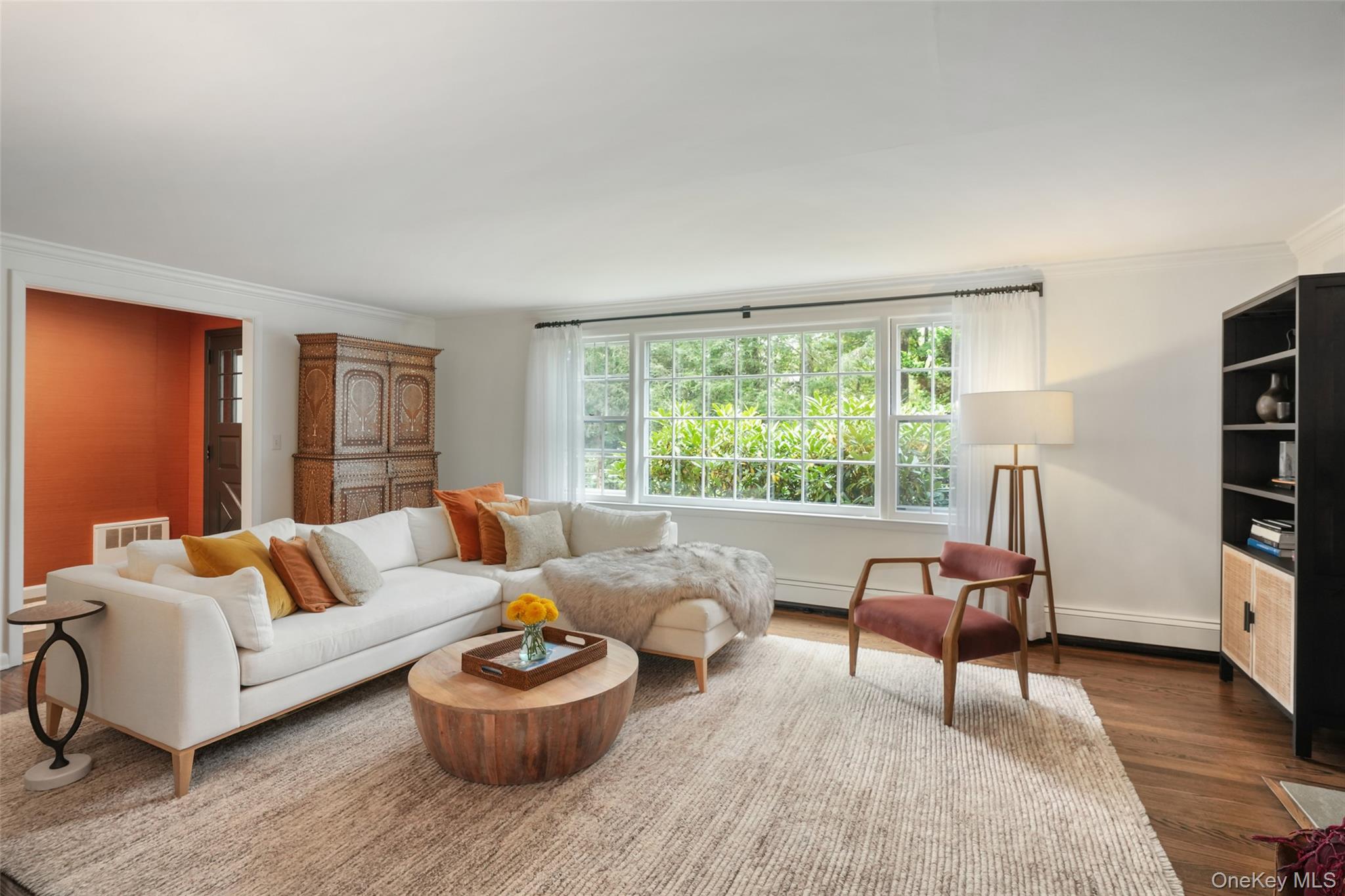 43 Croton Lake Road Katonah, NY 10536 - Photo 5 of 26 a living room with furniture and a large window