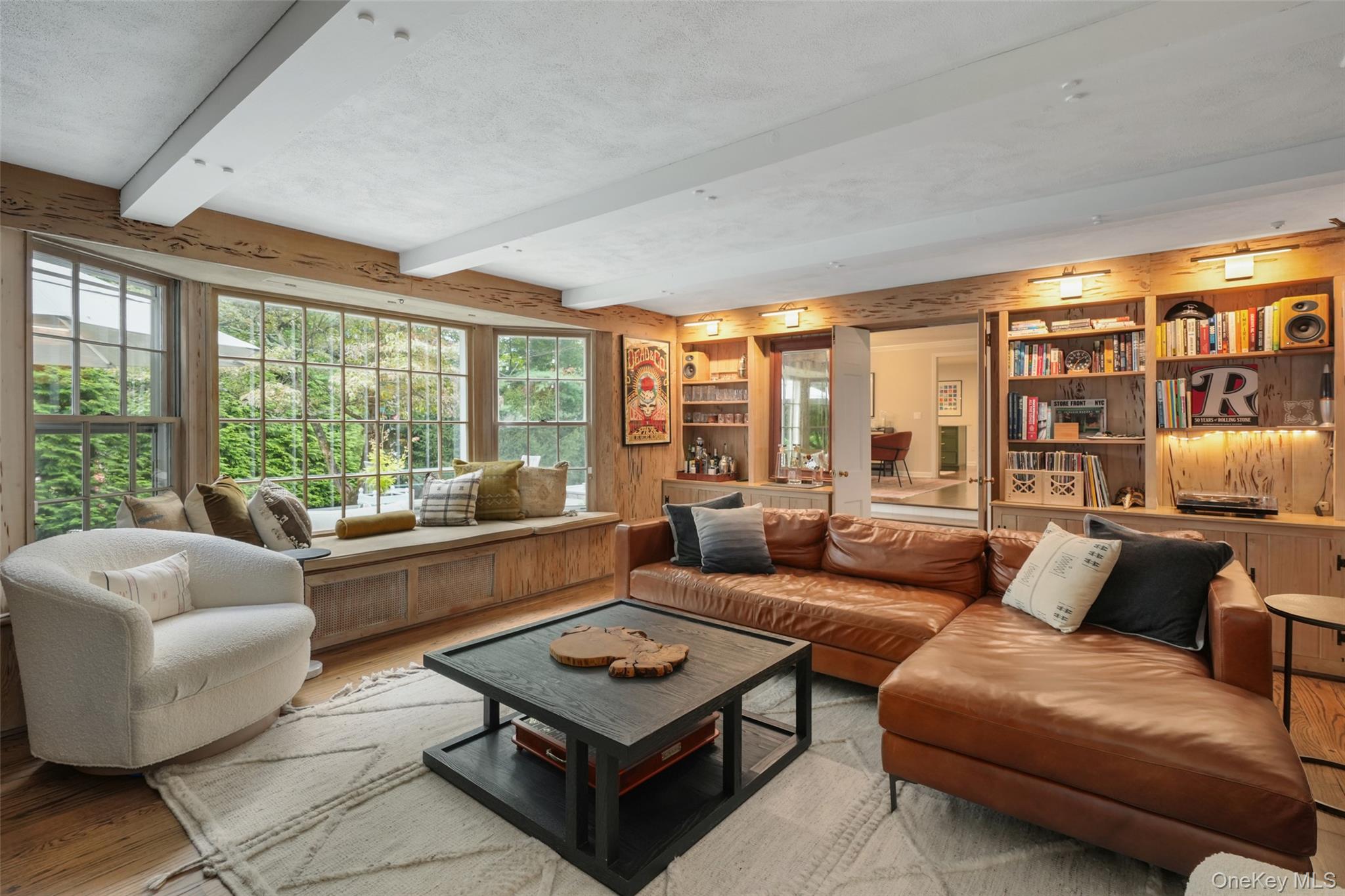 43 Croton Lake Road Katonah, NY 10536 - Photo 9 of 26 a living room with furniture and a large window