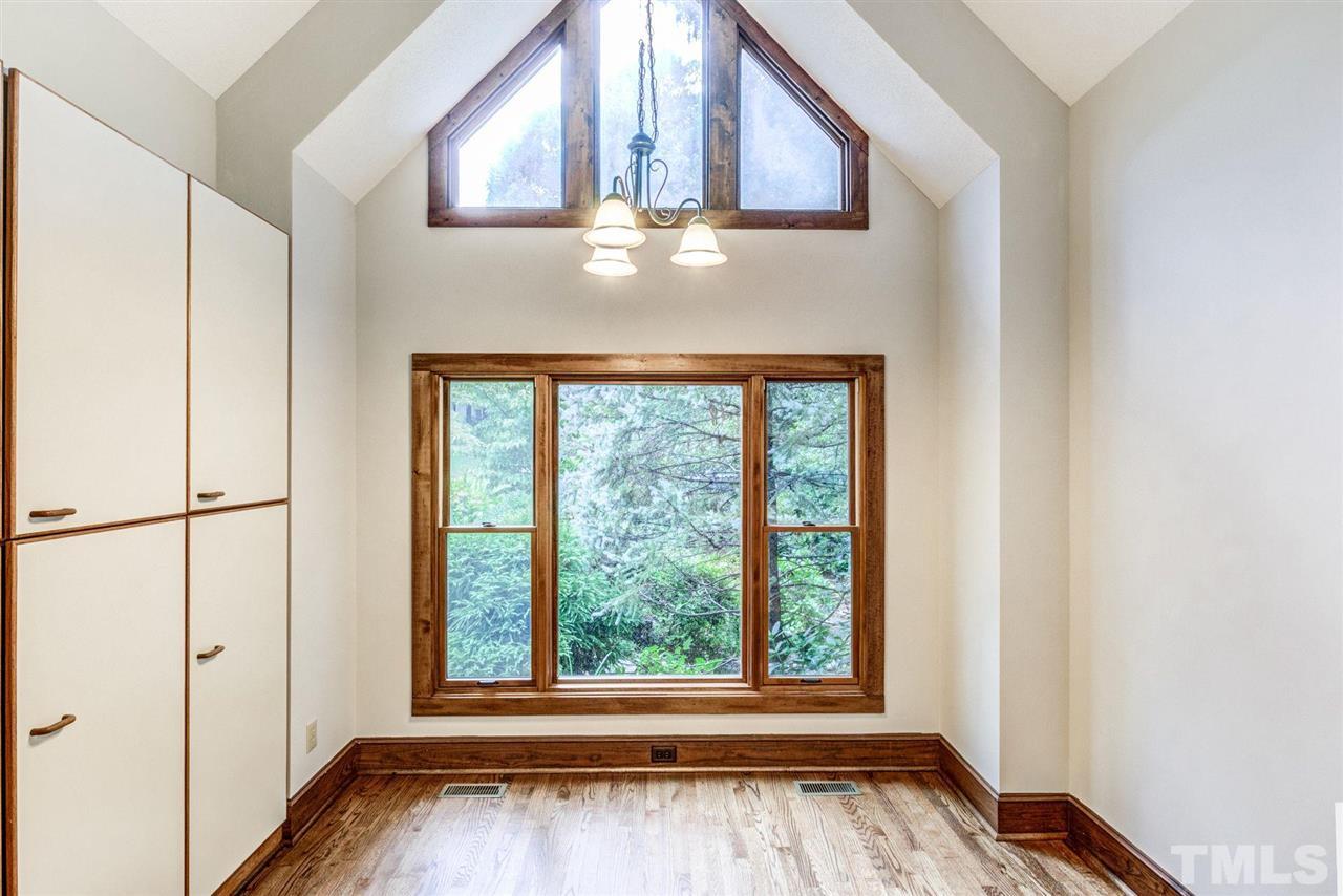 7604 Glenharden Drive Raleigh, NC 27613 - Photo 12 of 30 a view of an entryway with wooden floor