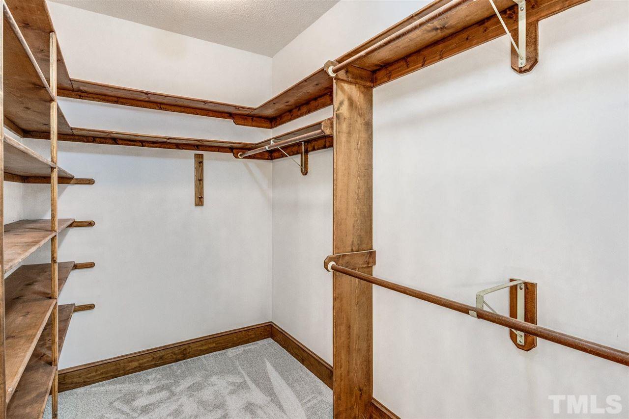 7604 Glenharden Drive Raleigh, NC 27613 - Photo 16 of 30 a view of walk in closet