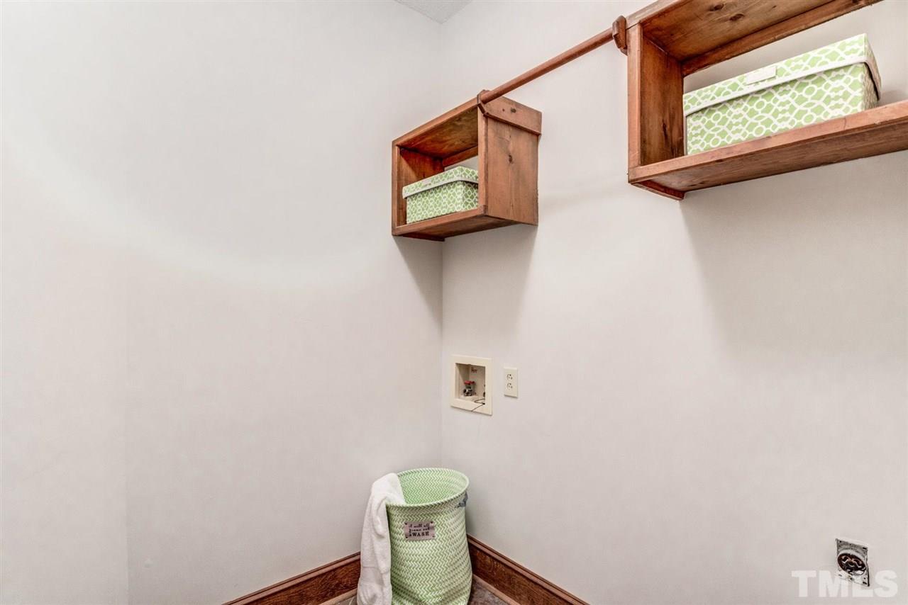 7604 Glenharden Drive Raleigh, NC 27613 - Photo 20 of 30 a bathroom with a toilet