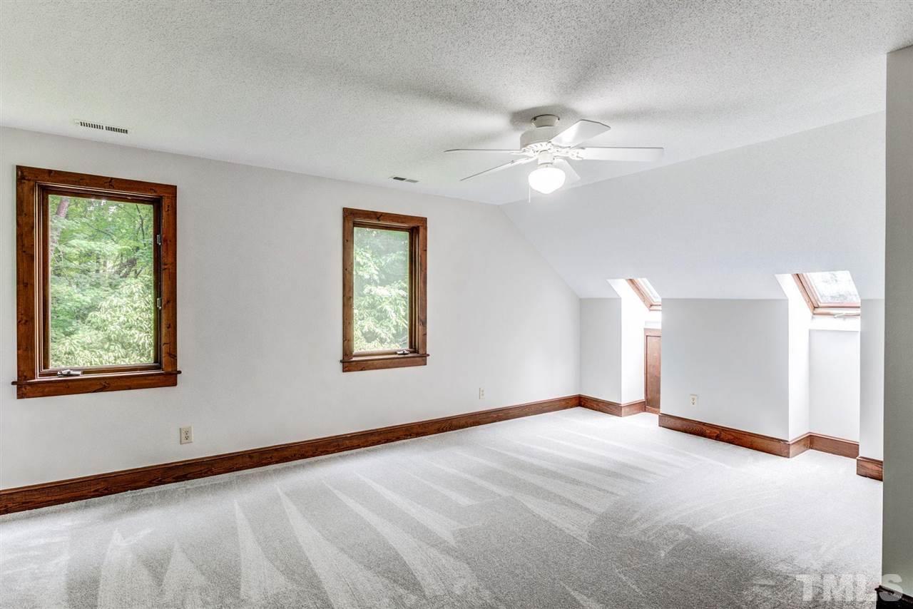 7604 Glenharden Drive Raleigh, NC 27613 - Photo 22 of 30 a view of an empty room with a window
