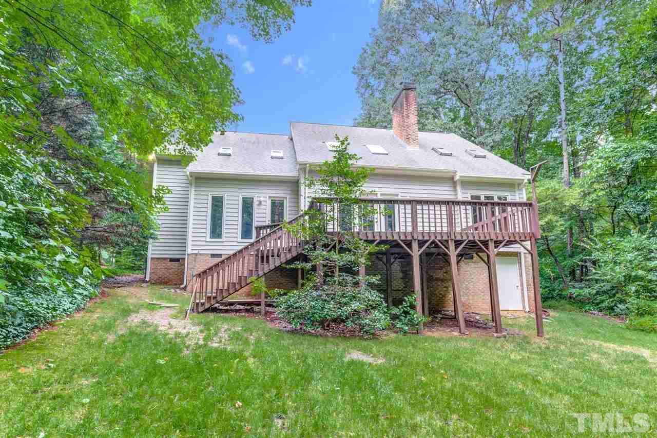7604 Glenharden Drive Raleigh, NC 27613 - Photo 29 of 30 a front view of a house with garden