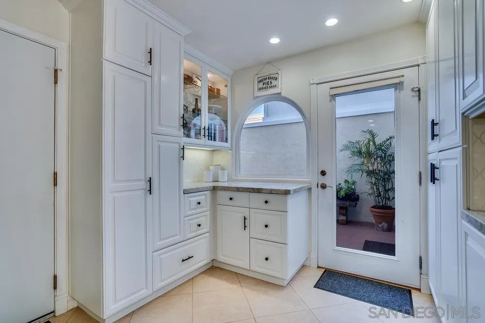 4 GingerTree Lane Coronado, CA 92118 - Photo 11 of 54 a view of hallway with sink and cabinets